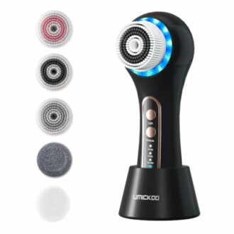 Electric facial cleansing brush with multiple brush heads.