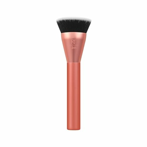 Orange makeup brush with black bristles