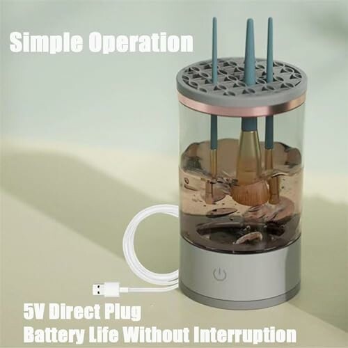 Makeup brush cleaner device with USB plug and simple operation.