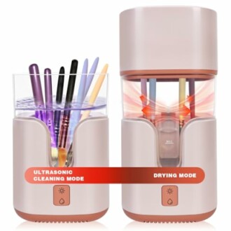 Ultrasonic makeup brush cleaner and dryer with brushes inside.