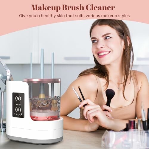 Woman using a makeup brush cleaner device.
