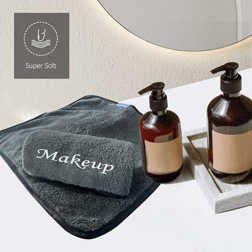 Super soft makeup removal towel and bottles on a counter.