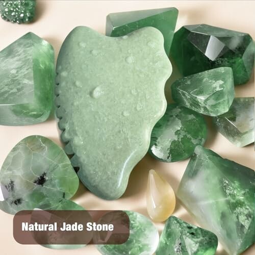 Collection of natural jade stones in various shapes and shades of green.