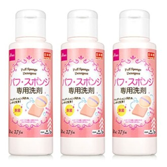 Three bottles of puff sponge detergent with pink labels.