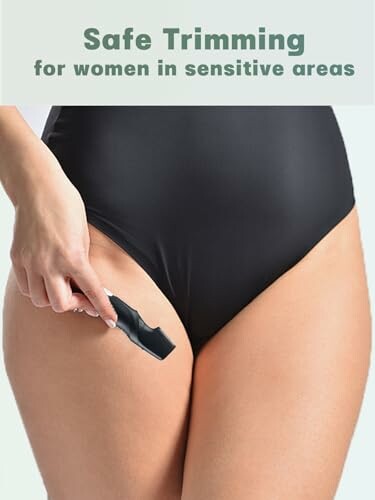 Woman using trimmer for sensitive areas.