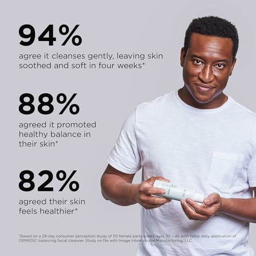 Man holding skincare product with testimonials about its benefits.