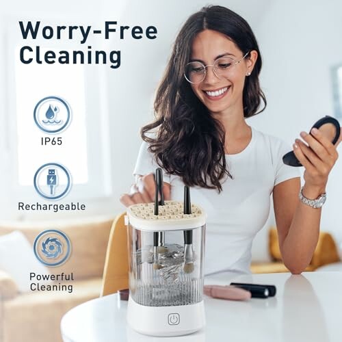 Woman using a rechargeable ultrasonic cleaner device with IP65 rating.